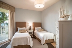 Beige_twinbeds_blue_walls